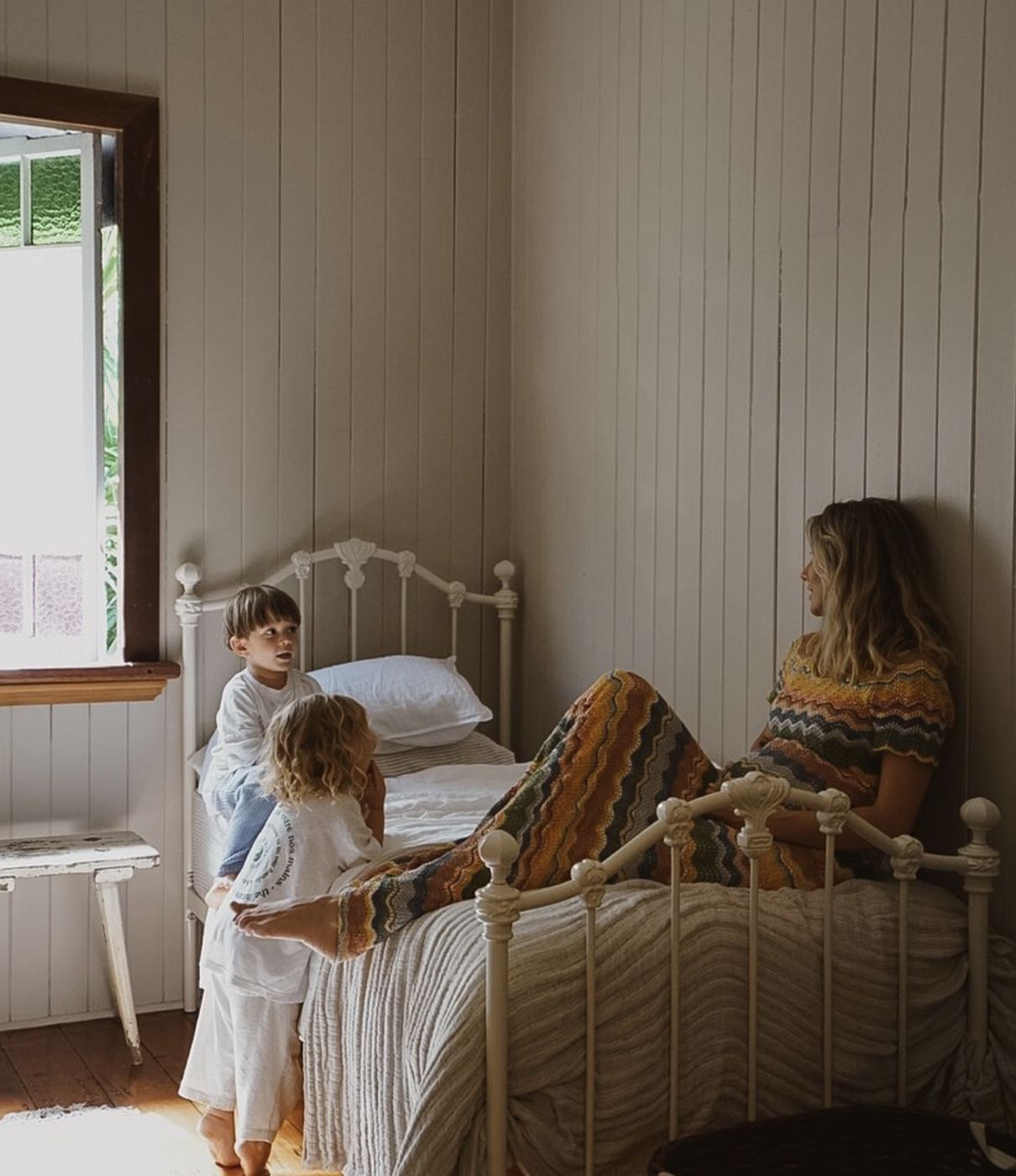 Rebecca with her kids at home
