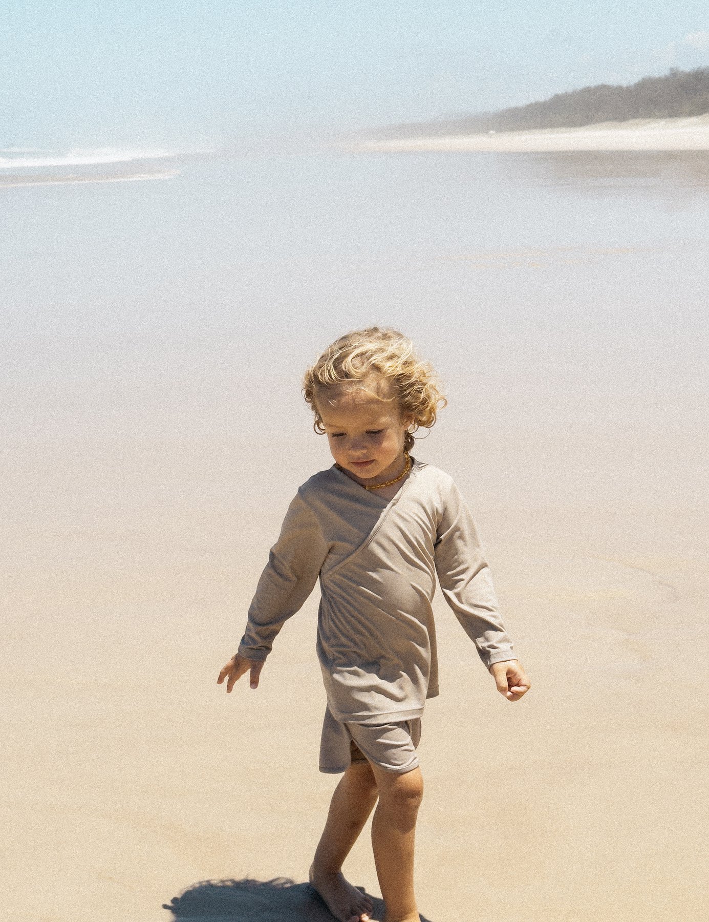 Kid walking on the beach